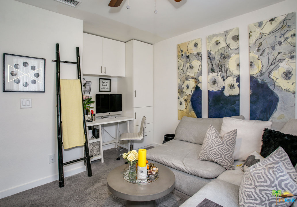 68120 Risueno Road Cathedral City, CA 92234 - Photo 23 of 35 a living room with furniture and a flat screen tv