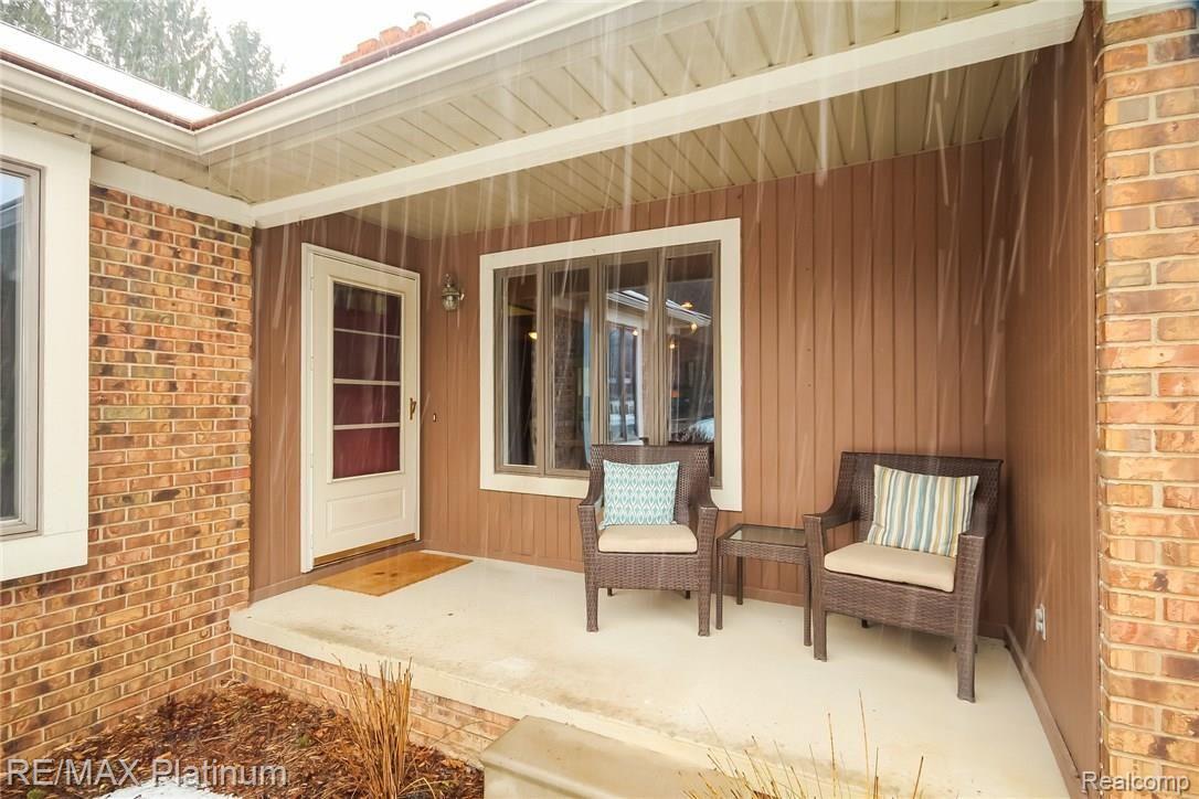 4047 Timberview Drive Howell, MI 48843 - Photo 57 of 59 Relax on this covered front porch