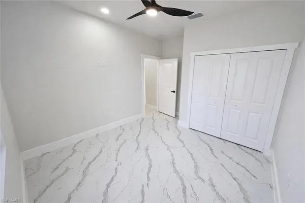 an aerial view of residential house with outdoor space and swimming pool