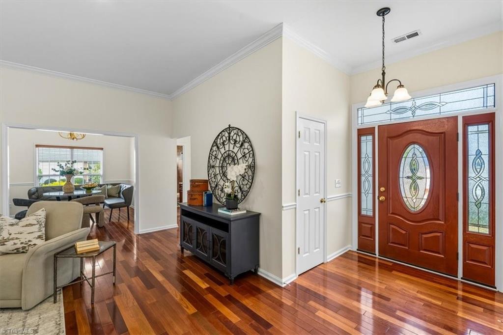 6505 Woodmont Road Jamestown, NC 27282 - Photo 3 of 43 Entry with beautiful Brazilian hardwoods!