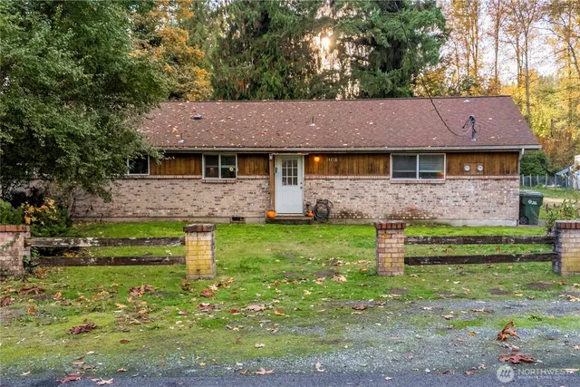 a front view of house with yard