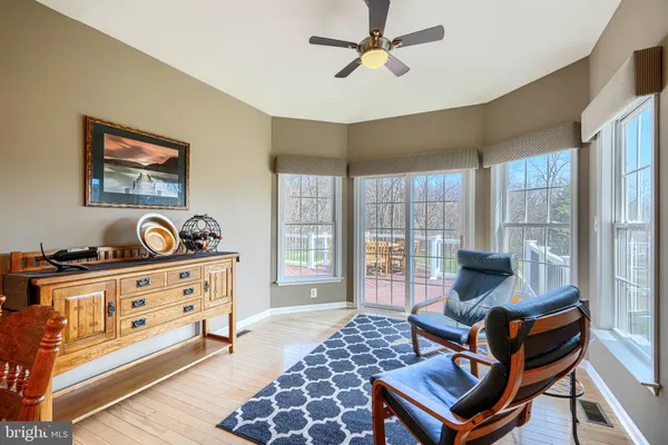 a room with furniture and wooden floor