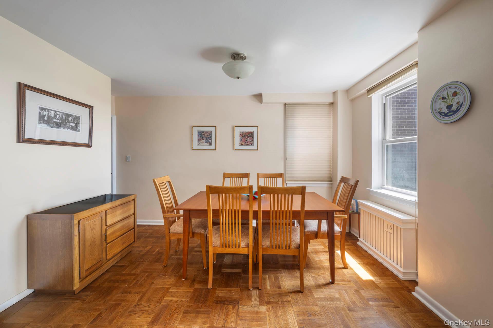 3135 Johnson Avenue, Unit 16C Bronx, NY 10463 - Photo 2 of 13 Dining area with baseboards and radiator heating unit