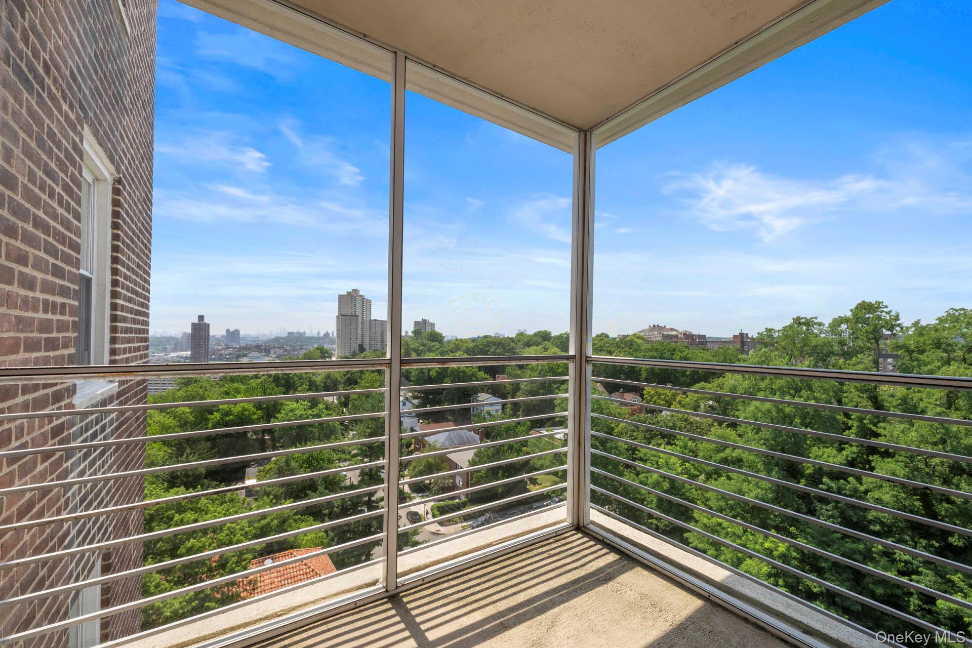 3135 Johnson Avenue, Unit 16C Bronx, NY 10463 - Photo 7 of 13 Balcony featuring a city view