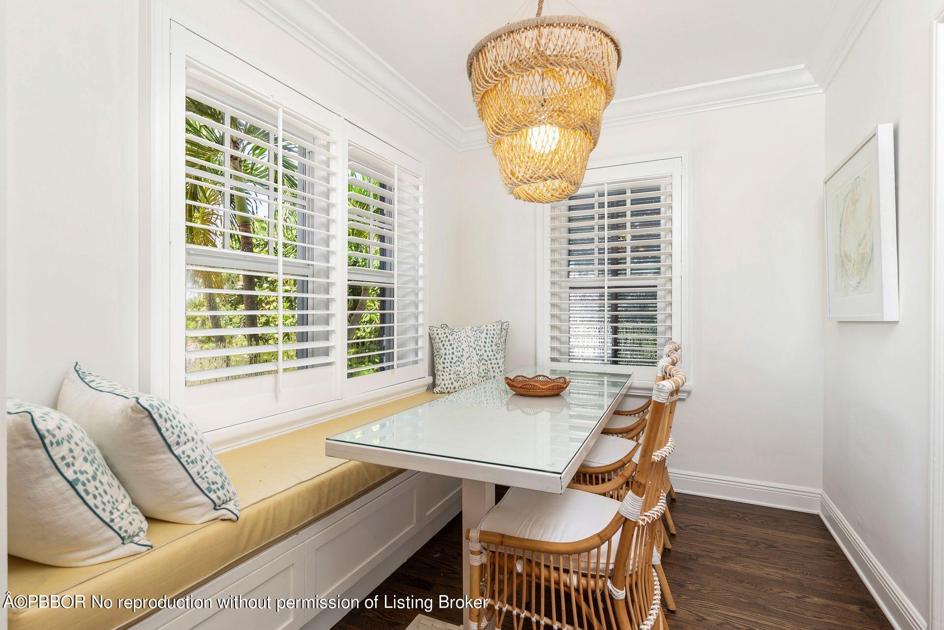 231 Cocoanut Row Palm Beach, FL 33480 - Photo 11 of 27 a view of a dining room with furniture window and wooden floor
