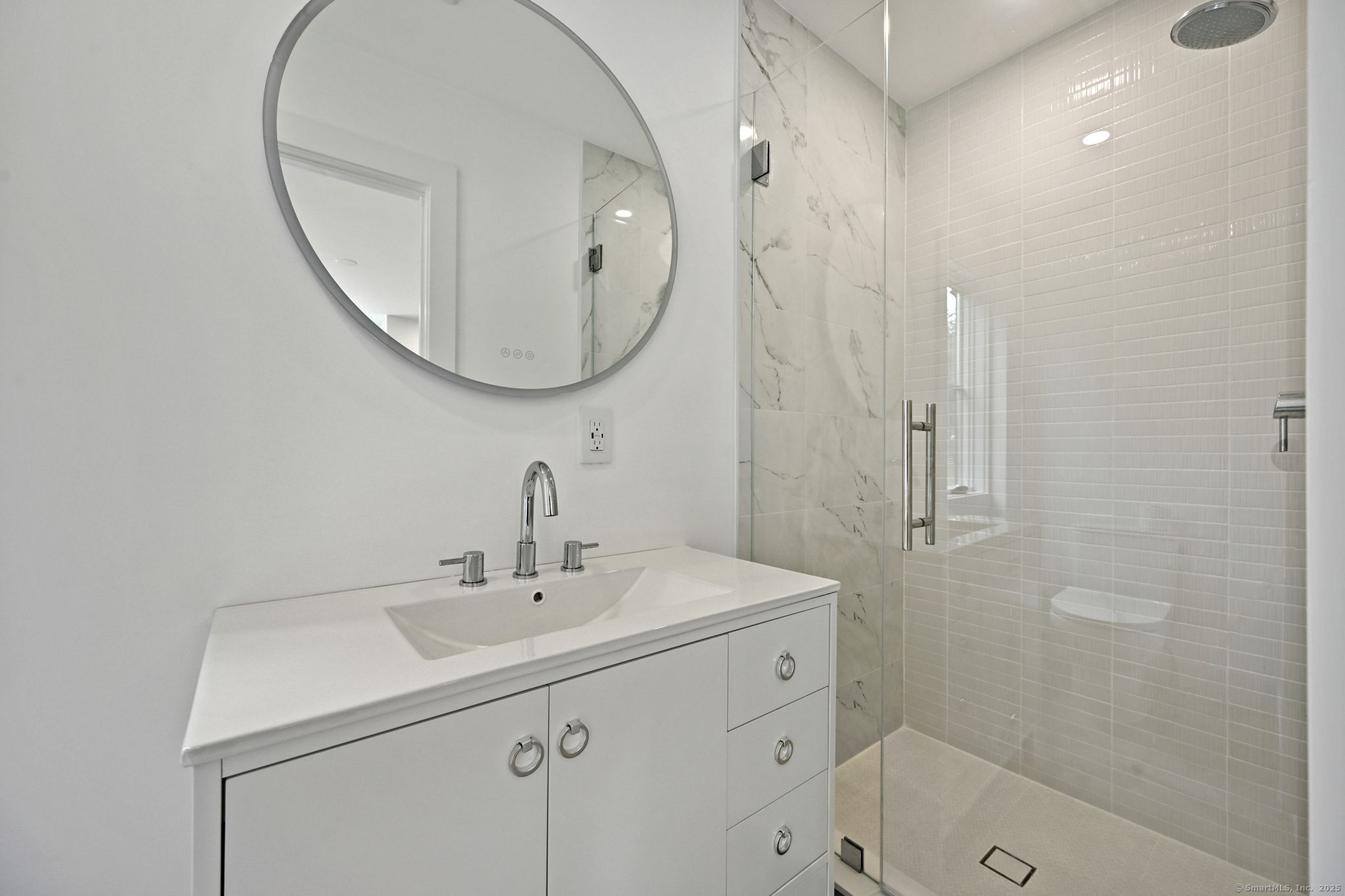 30 Cavalry Road Westport, CT 06880 - Photo 31 of 45 a bathroom with a sink a toilet and a mirror