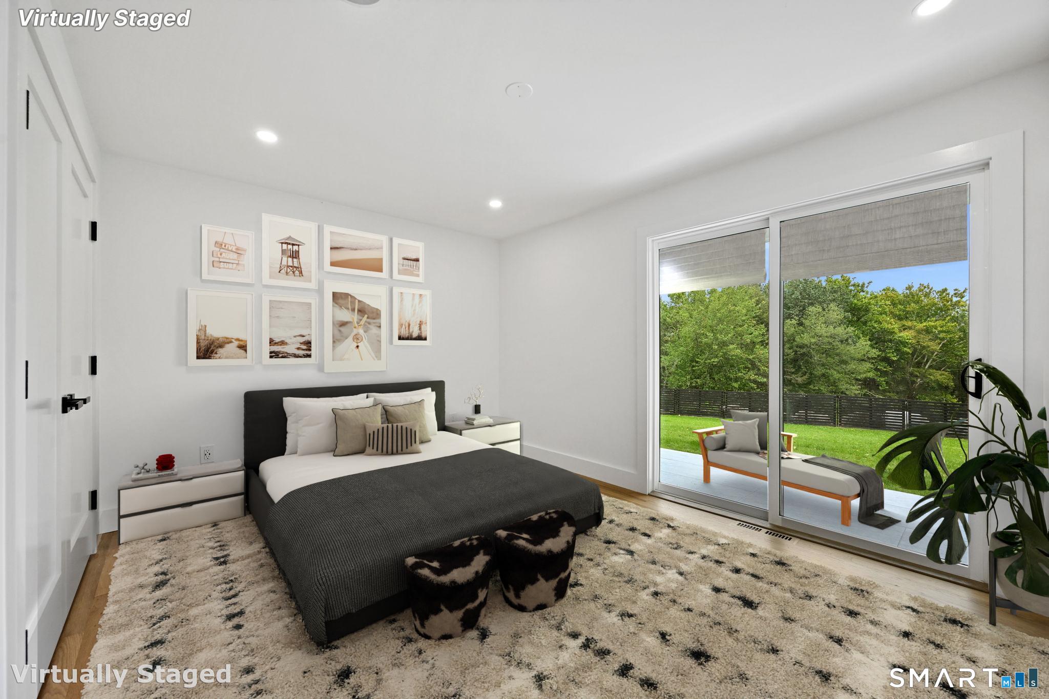 30 Cavalry Road Westport, CT 06880 - Photo 38 of 45 a bedroom with furniture and a large window