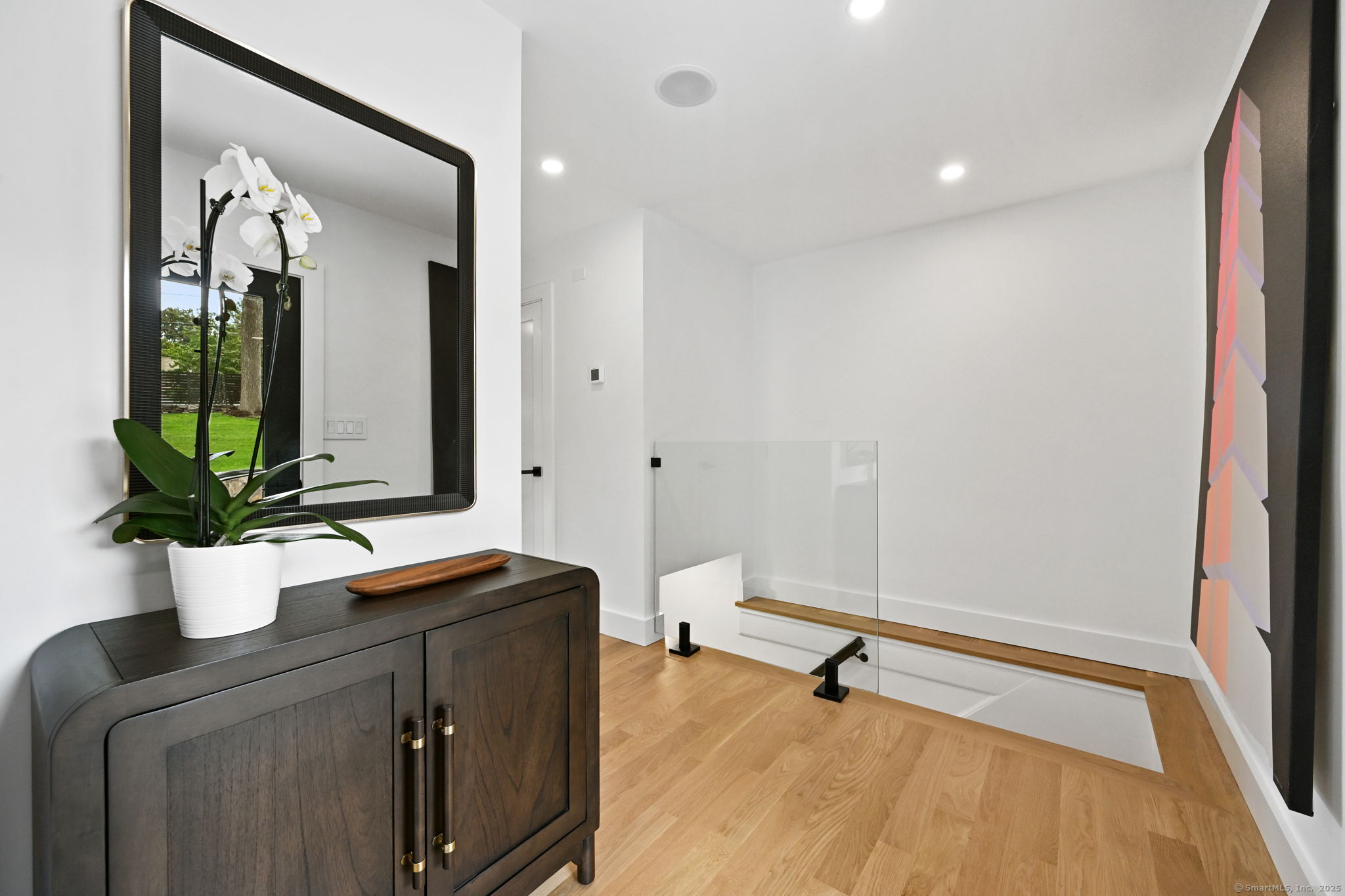 30 Cavalry Road Westport, CT 06880 - Photo 9 of 45 a bathroom with a sink and a mirror