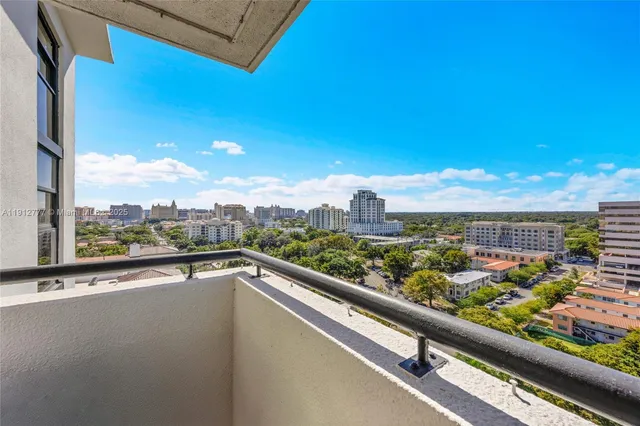 a view of a city skyline from a balcony