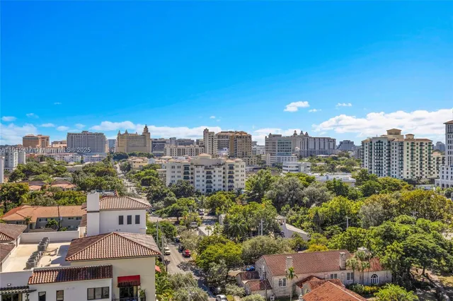 a view of a city with tall buildings