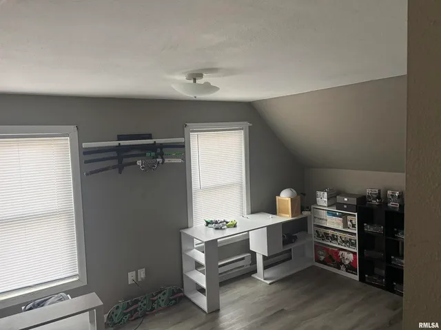 a room with furniture and a window