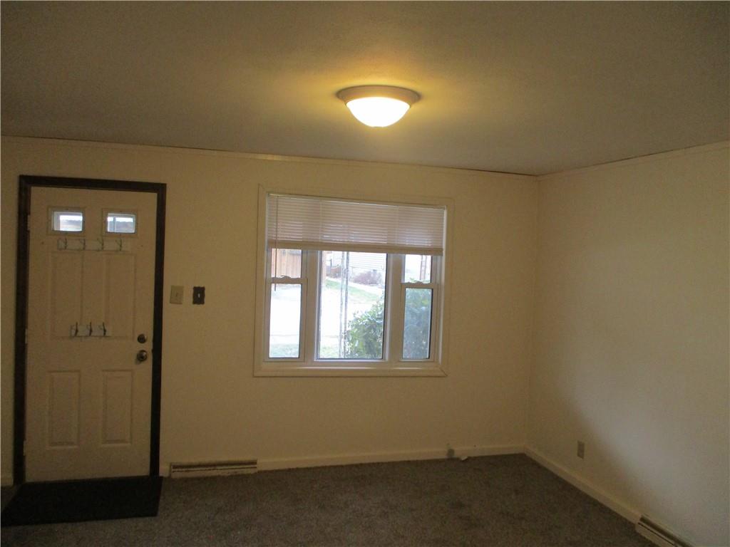 132 Armour Street Richeyville, PA 15358 - Photo 11 of 29 an empty room with windows and closet