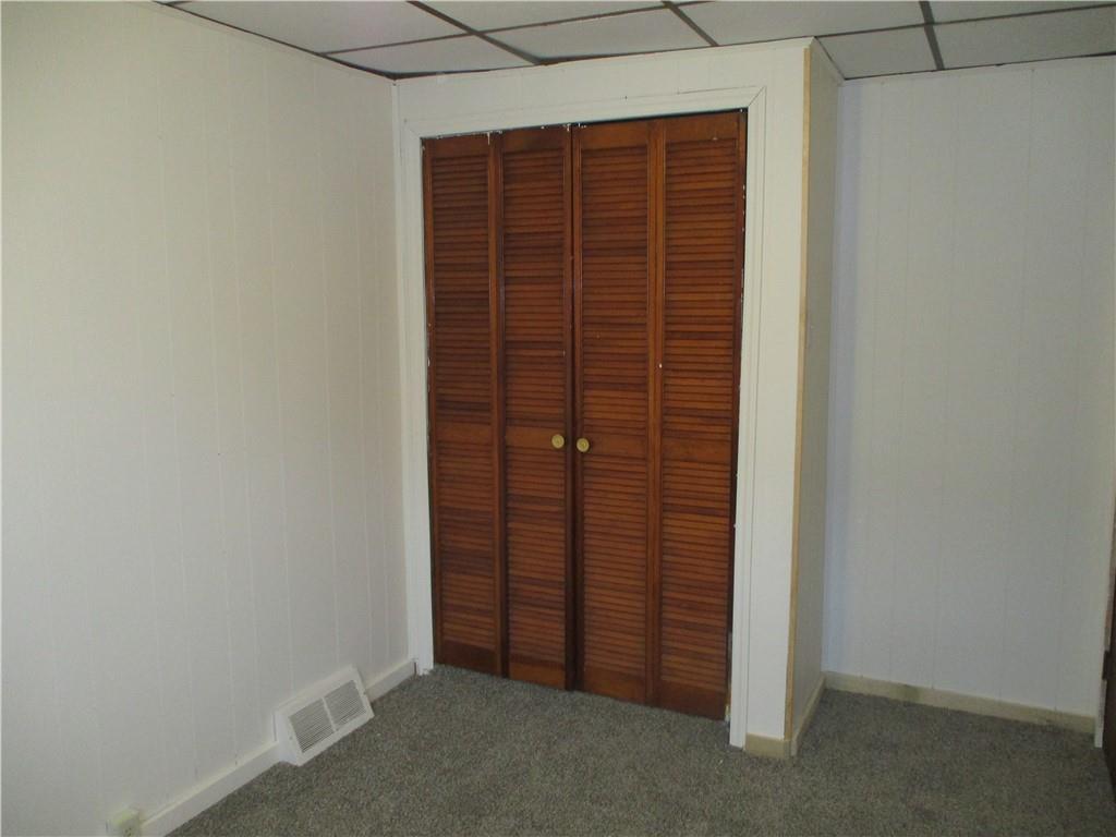 132 Armour Street Richeyville, PA 15358 - Photo 20 of 29 an empty room with a wooden door