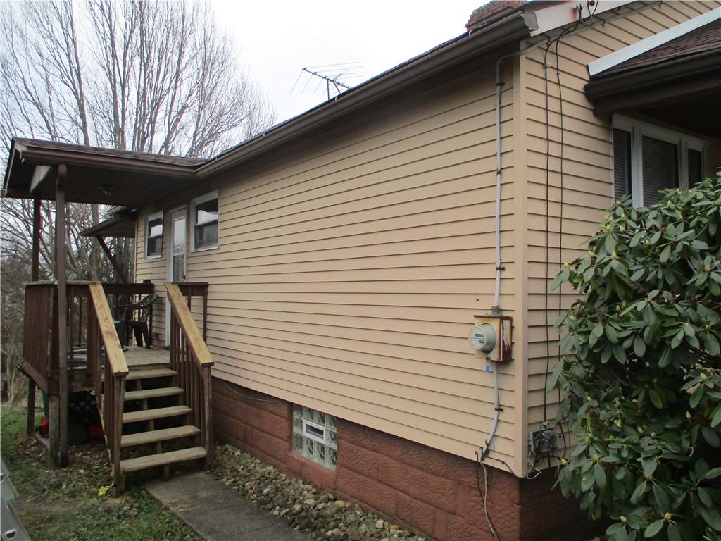 132 Armour Street Richeyville, PA 15358 - Photo 3 of 29 a view of a patio with wooden floor and a barbeque