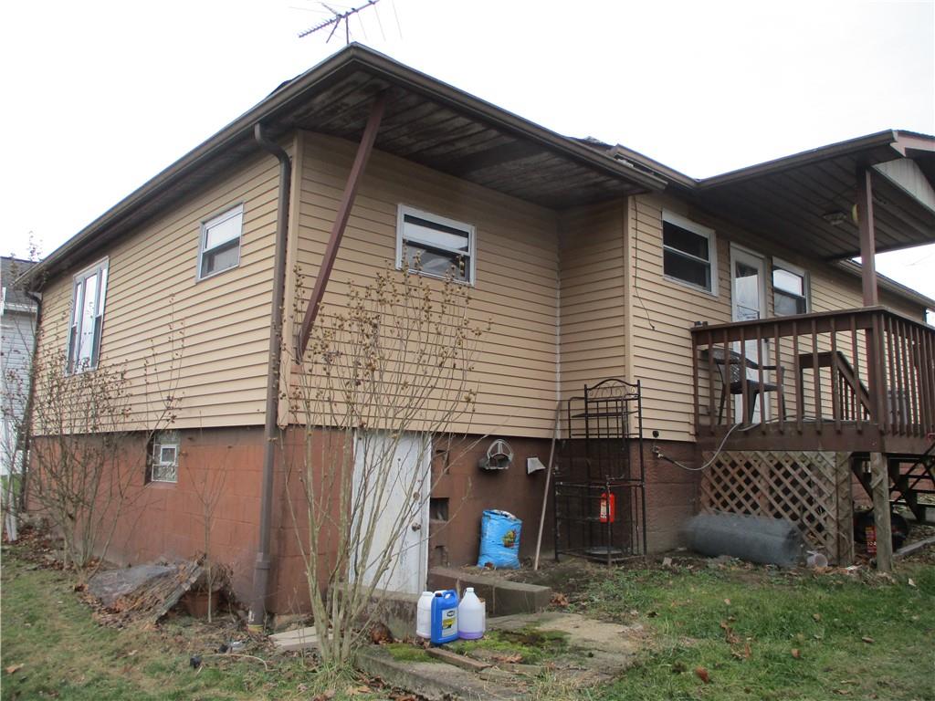 132 Armour Street Richeyville, PA 15358 - Photo 4 of 29 a front view of a house with garden