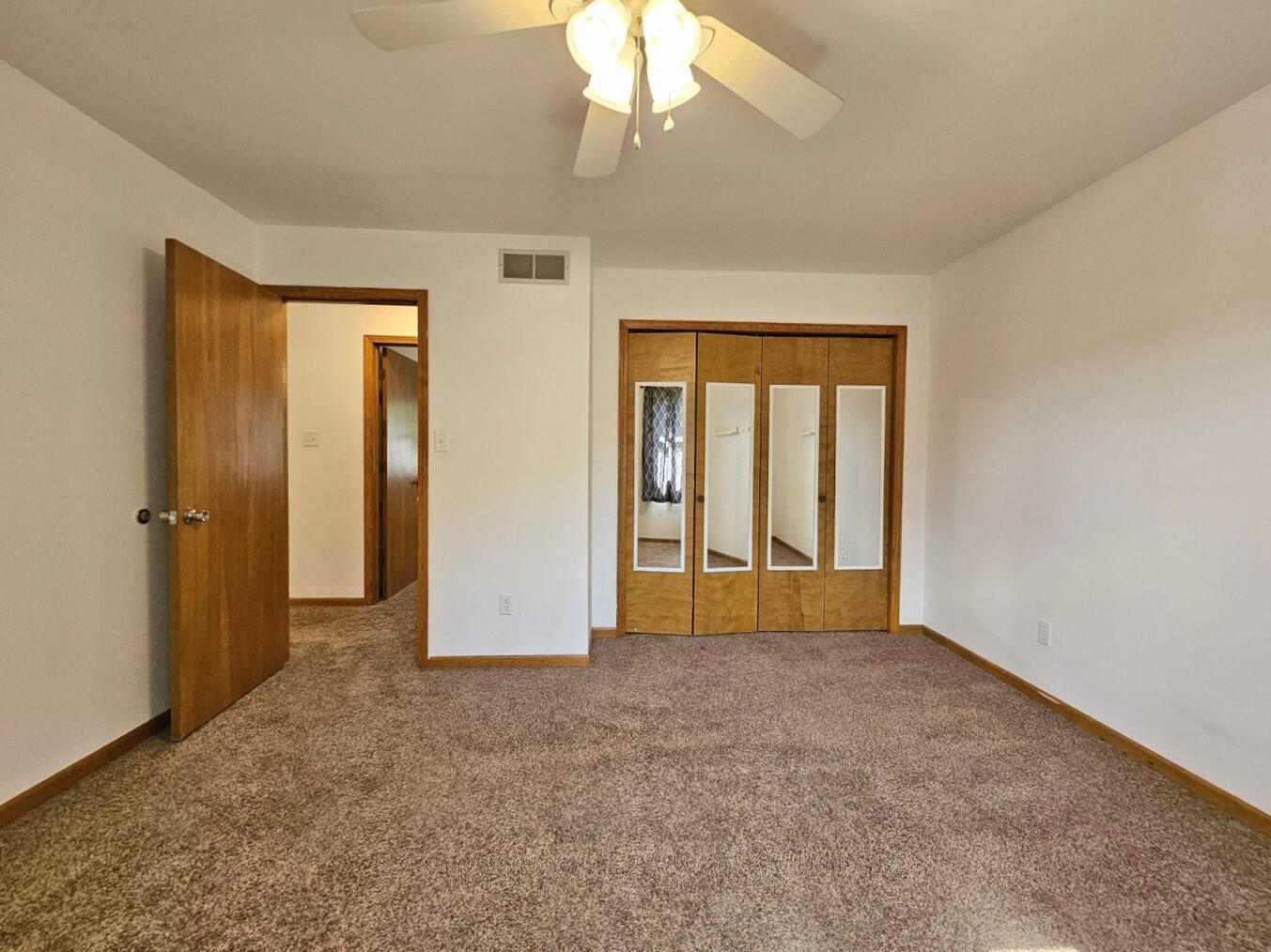 647 North Calumet Road Chesterton, IN 46304 - Photo 17 of 42 a view of an empty room with a window