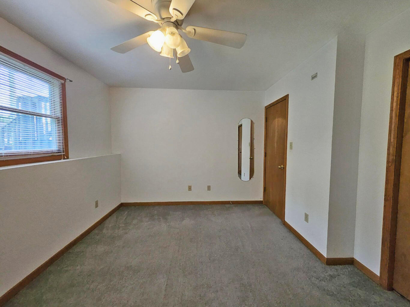 647 North Calumet Road Chesterton, IN 46304 - Photo 19 of 42 an empty room with windows and fan
