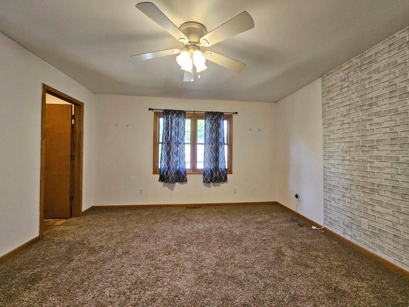647 North Calumet Road Chesterton, IN 46304 - Photo 25 of 42 a view of an empty room with a window