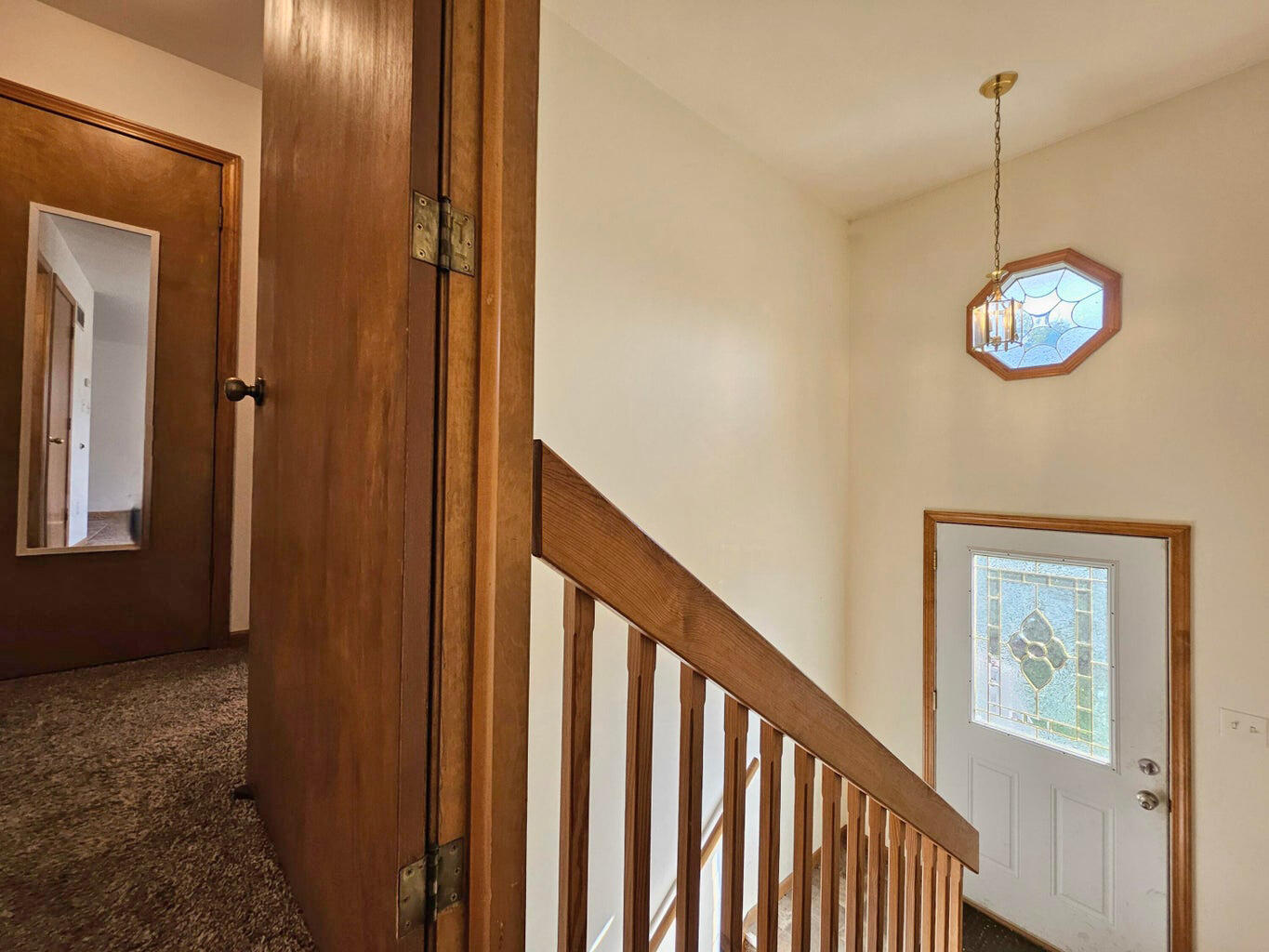 647 North Calumet Road Chesterton, IN 46304 - Photo 28 of 42 a view of a hallway with windows