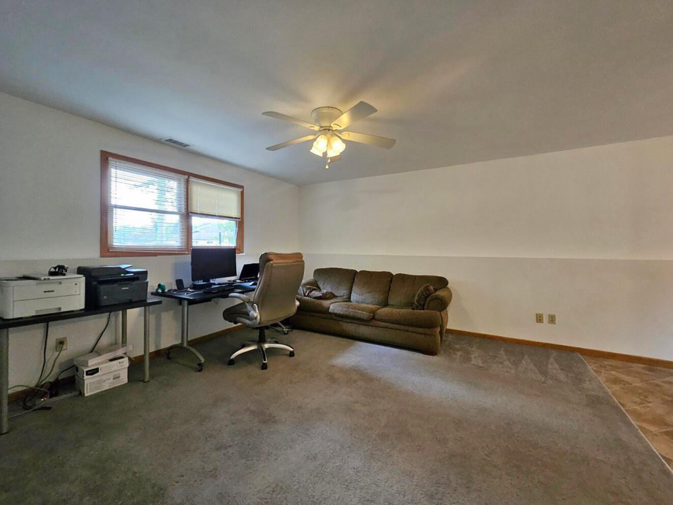 647 North Calumet Road Chesterton, IN 46304 - Photo 30 of 42 a living room with furniture and a gym equipment