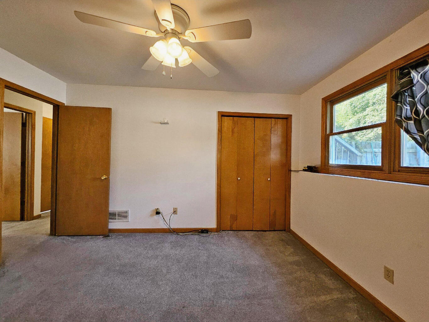 647 North Calumet Road Chesterton, IN 46304 - Photo 39 of 42 an empty room with windows and fan