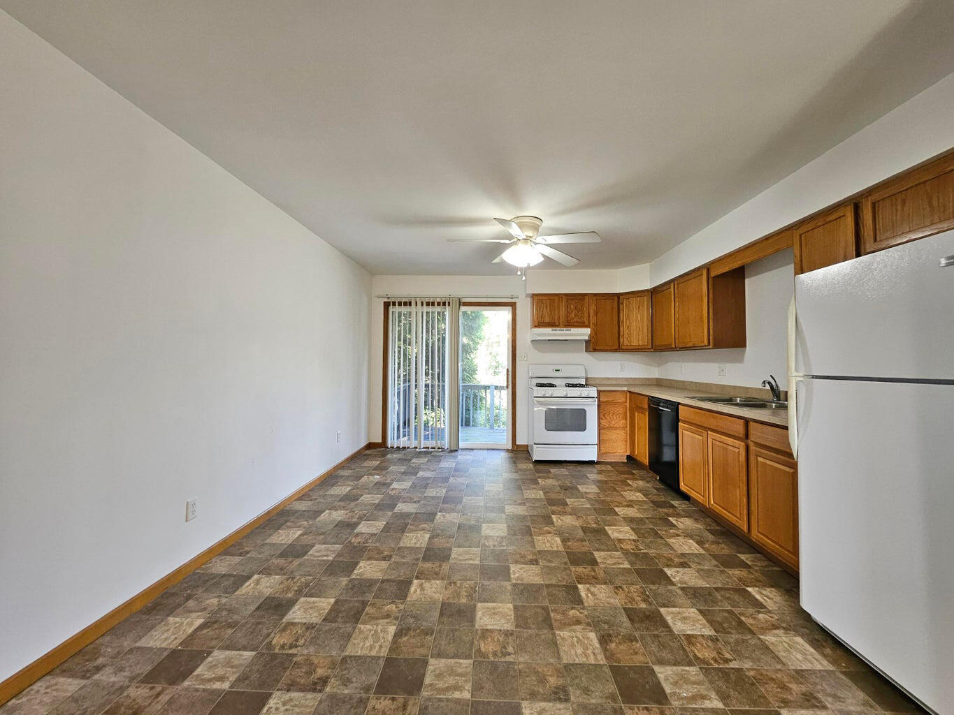 647 North Calumet Road Chesterton, IN 46304 - Photo 9 of 42 a large kitchen with a stove a refrigerator and a stove top oven