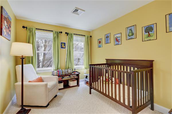 11 Whitney Street, Unit 11 Brookline, MA 02467 - Photo 11 of 20 a living room with furniture and a window