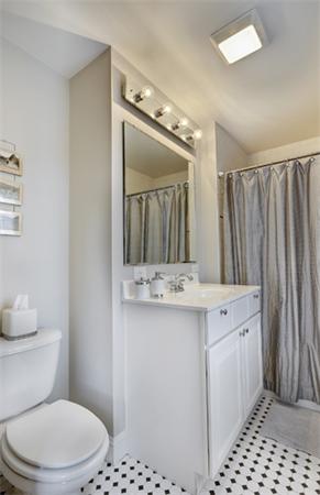 11 Whitney Street, Unit 11 Brookline, MA 02467 - Photo 15 of 20 a bathroom with a sink a toilet and mirror