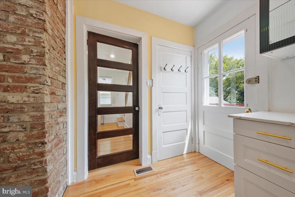 313 Fairview Avenue Moorestown, NJ 08057 - Photo 25 of 47 a view of an entryway with wooden floor and cabinets
