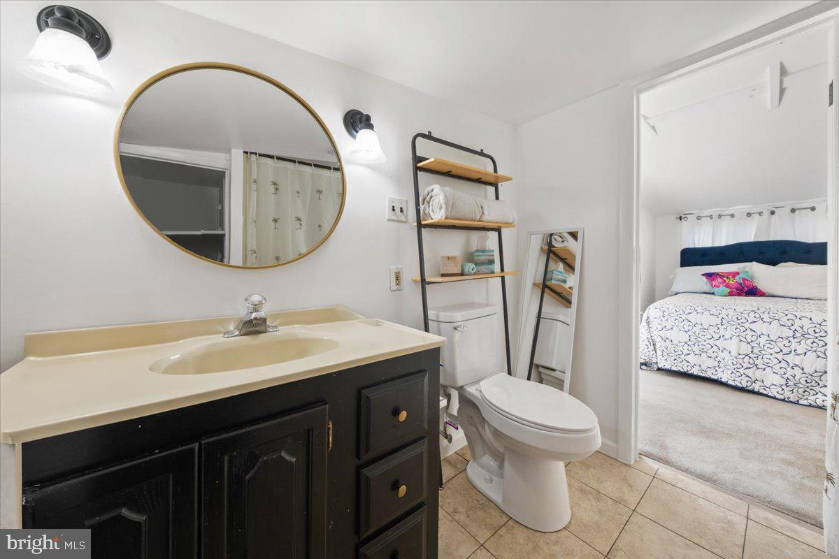 313 Fairview Avenue Moorestown, NJ 08057 - Photo 30 of 47 a bathroom with a toilet a sink and a mirror