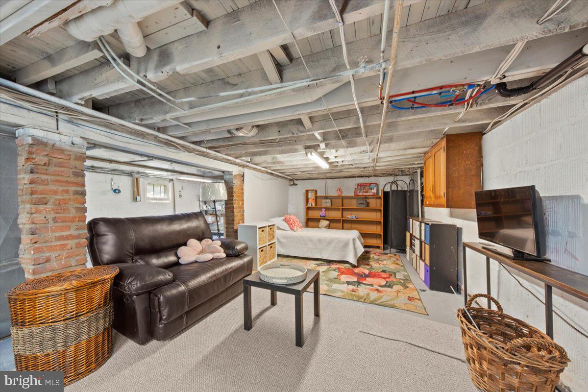 313 Fairview Avenue Moorestown, NJ 08057 - Photo 36 of 47 a living room with furniture and a flat screen tv