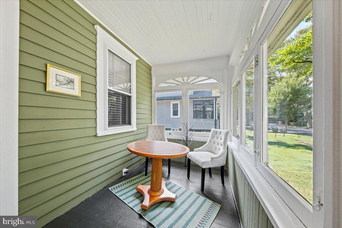 313 Fairview Avenue Moorestown, NJ 08057 - Photo 5 of 47 a view of a patio with table and chairs and wooden floor