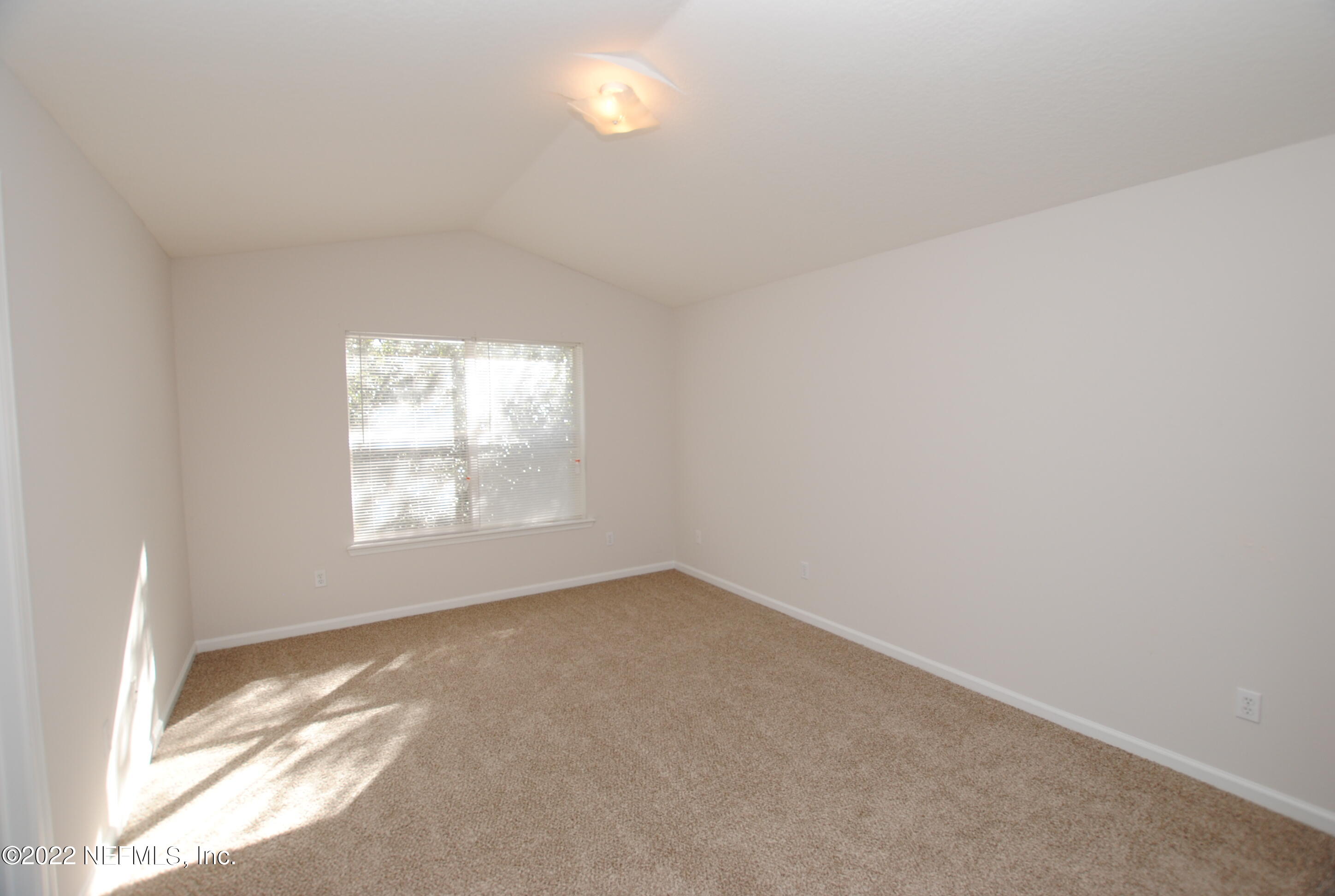 5260 Collins Road, Unit 505 Jacksonville, FL 32244 - Photo 12 of 20 a view of room and window