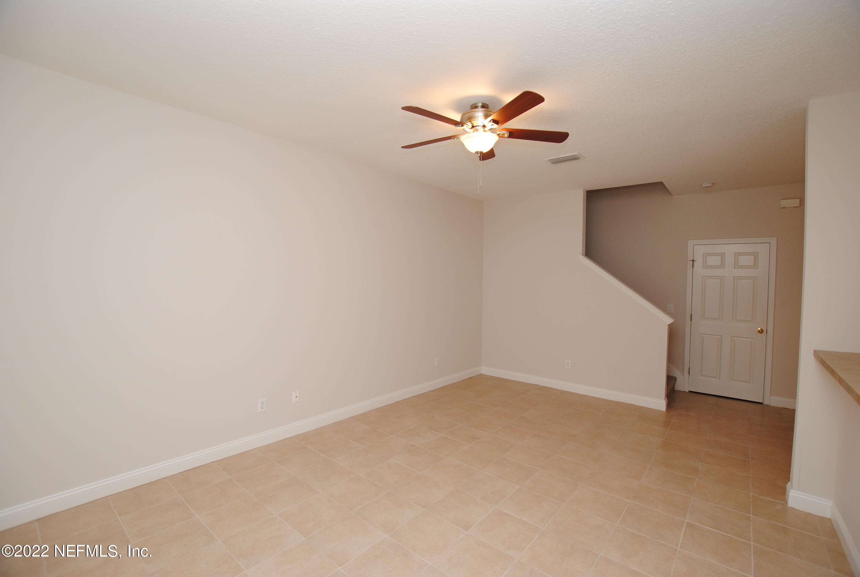 5260 Collins Road, Unit 505 Jacksonville, FL 32244 - Photo 8 of 20 a view of a big room with carpet