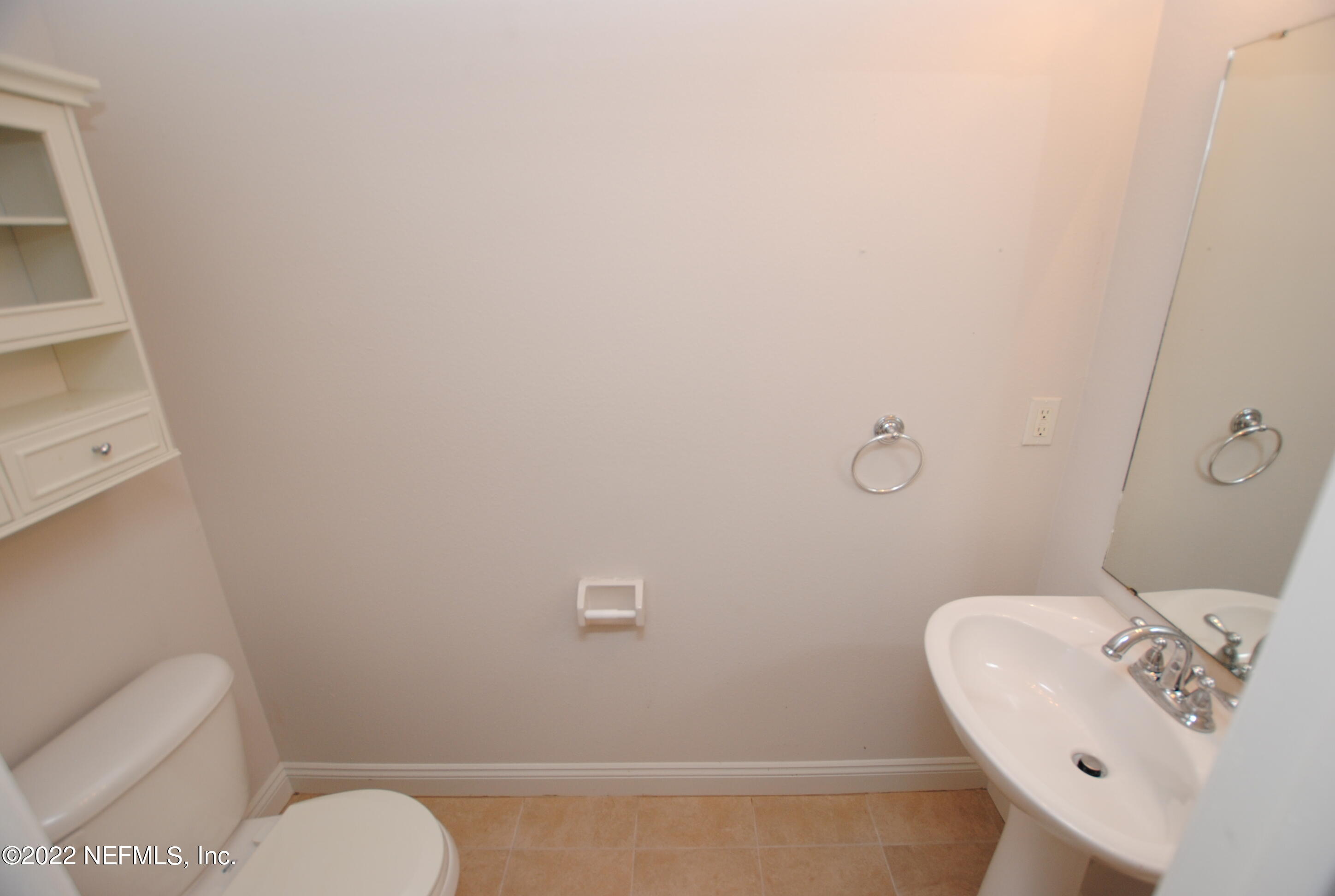 5260 Collins Road, Unit 505 Jacksonville, FL 32244 - Photo 10 of 20 a bathroom with a toilet and a sink