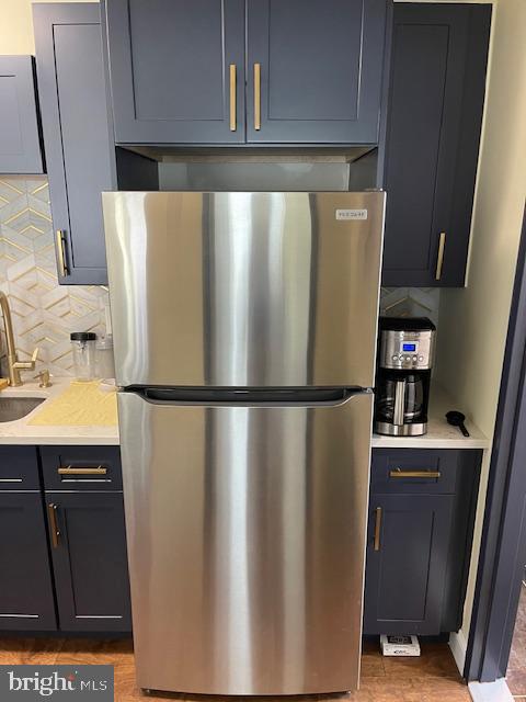 2101 Chestnut Street, Unit 504 Philadelphia, PA 19103 - Photo 11 of 28 a white refrigerator freezer sitting in a kitchen