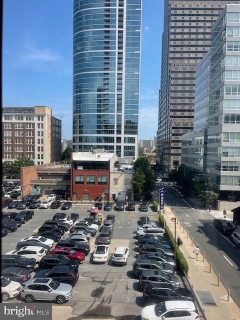 2101 Chestnut Street, Unit 504 Philadelphia, PA 19103 - Photo 18 of 28 a view of a patio with table and chairs and potted plants