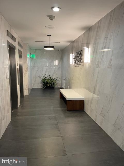 2101 Chestnut Street, Unit 504 Philadelphia, PA 19103 - Photo 25 of 28 a spacious bathroom with a double vanity sink and a mirror