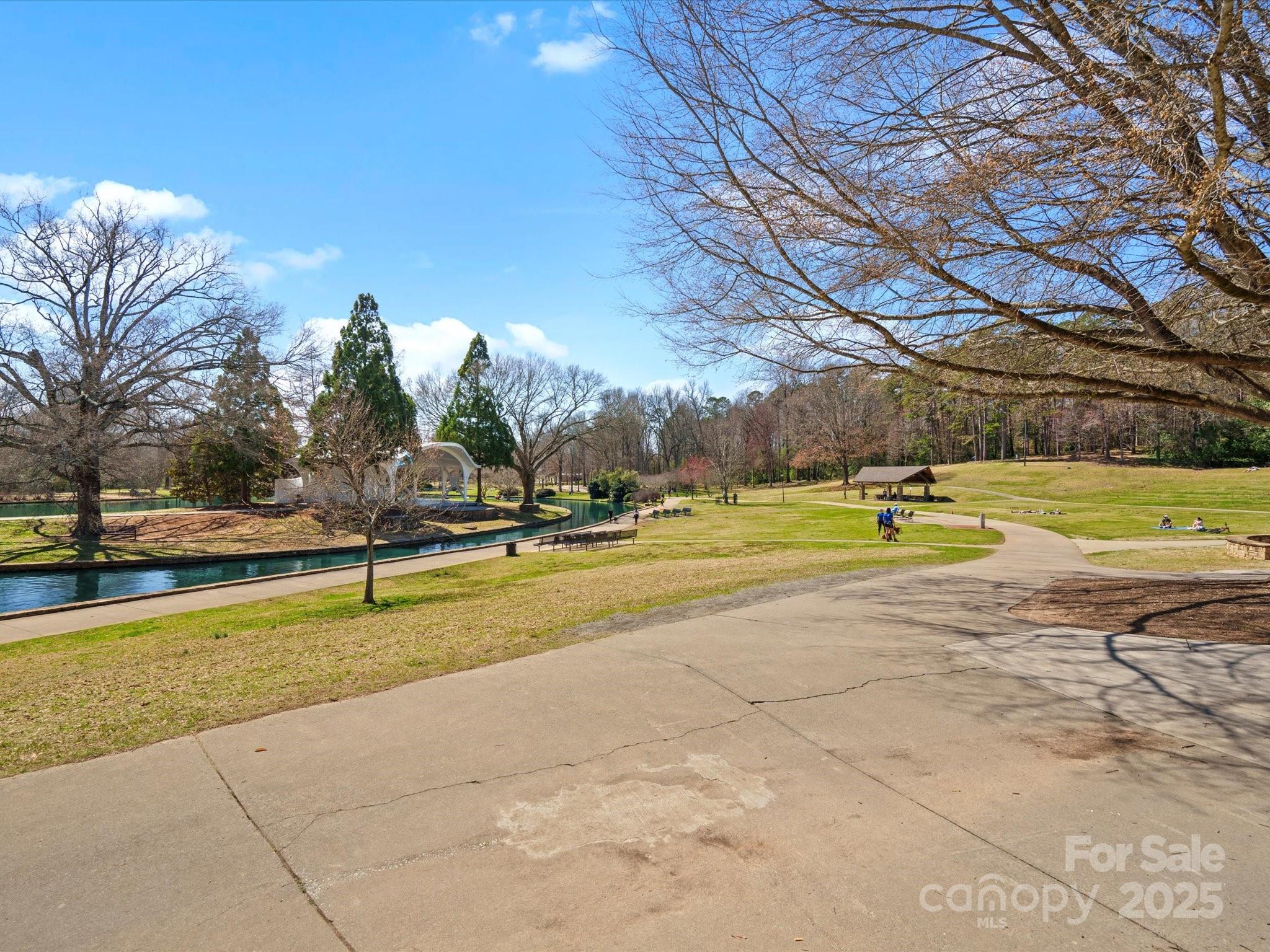1539 Lilac Road Charlotte, NC 28209 - Photo 13 of 16 a view of a swimming pool with an outdoor space and seating area