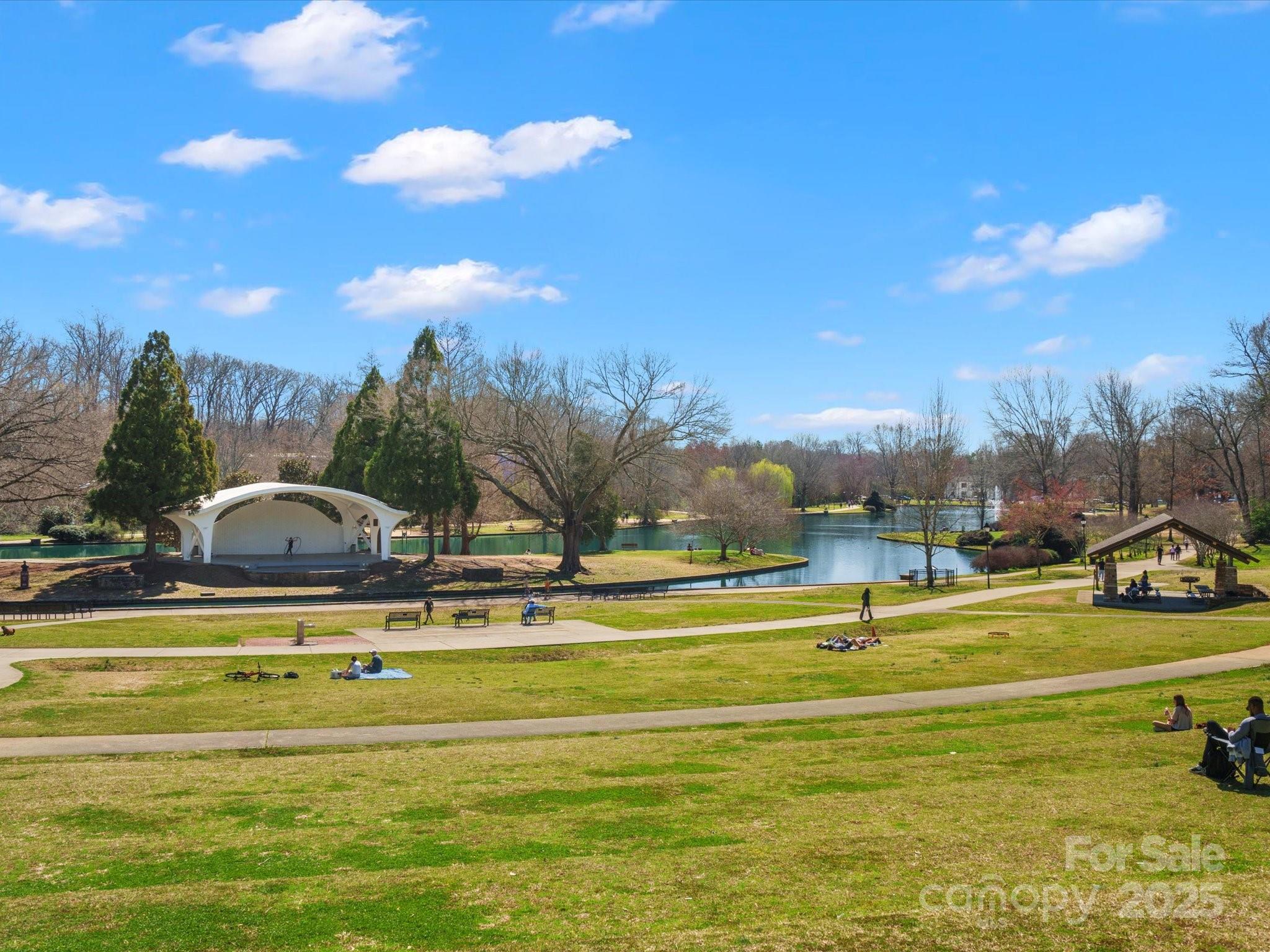 1539 Lilac Road Charlotte, NC 28209 - Photo 14 of 16 a view of a swimming pool with an outdoor space and seating