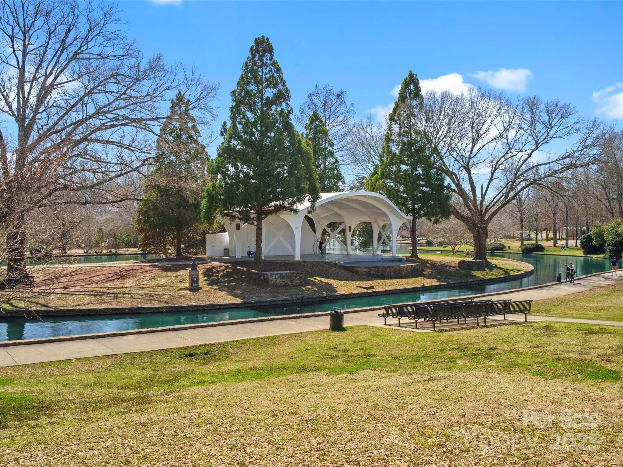 1539 Lilac Road Charlotte, NC 28209 - Photo 15 of 16 a view of yard with swimming pool and trees