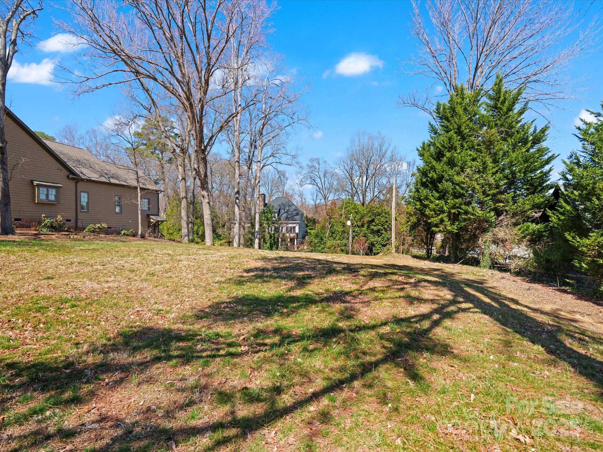 1539 Lilac Road Charlotte, NC 28209 - Photo 2 of 16 a view of yard covered with snow in front of house