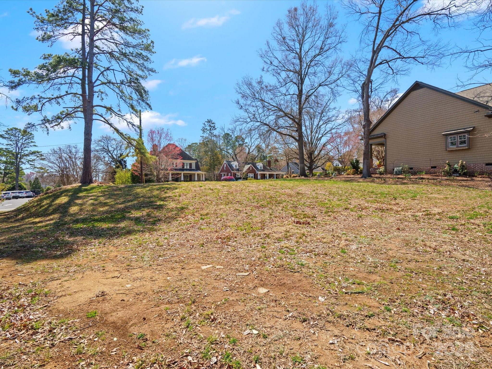 1539 Lilac Road Charlotte, NC 28209 - Photo 3 of 16 a view of a house with a yard