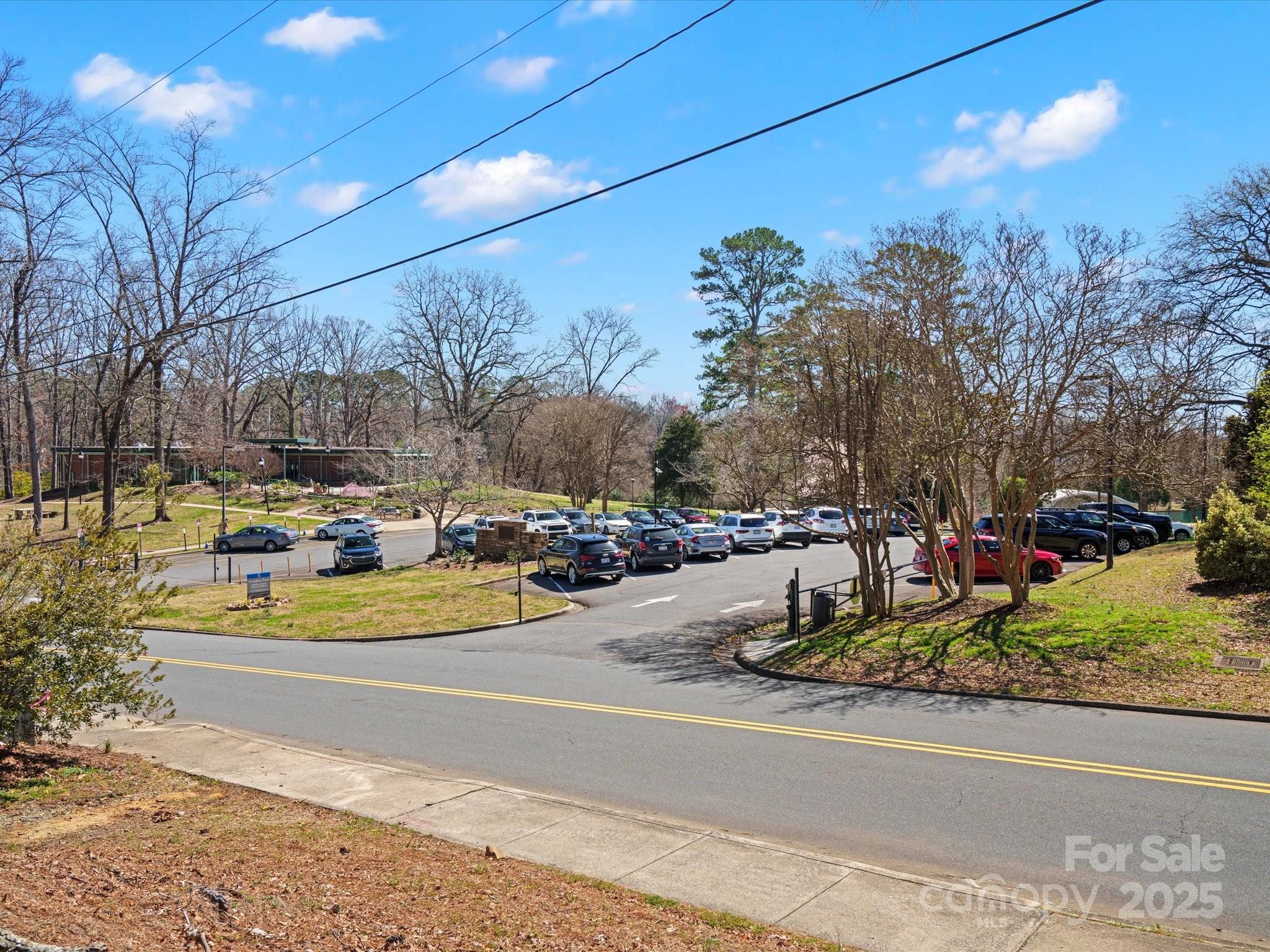 1539 Lilac Road Charlotte, NC 28209 - Photo 7 of 16 a view of a park with large trees