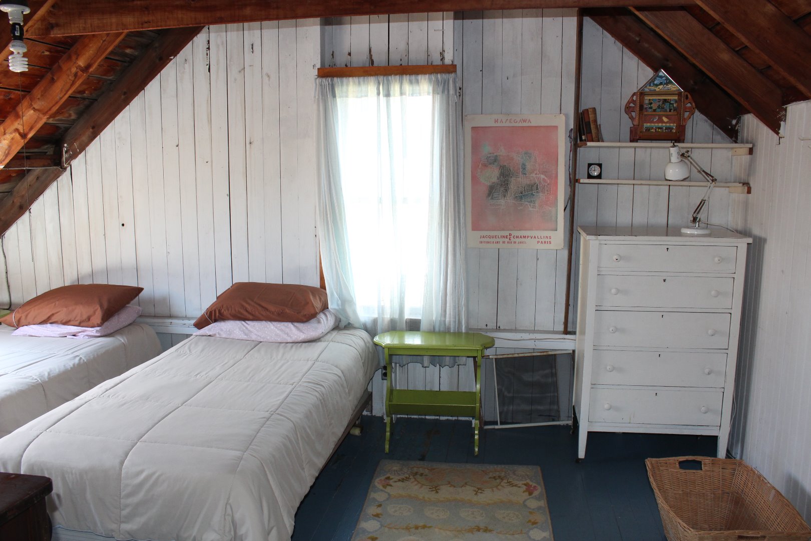 508 N Road Chilmark, MA 02535 - Photo 8 of 10 a bed room with two beds and a chair