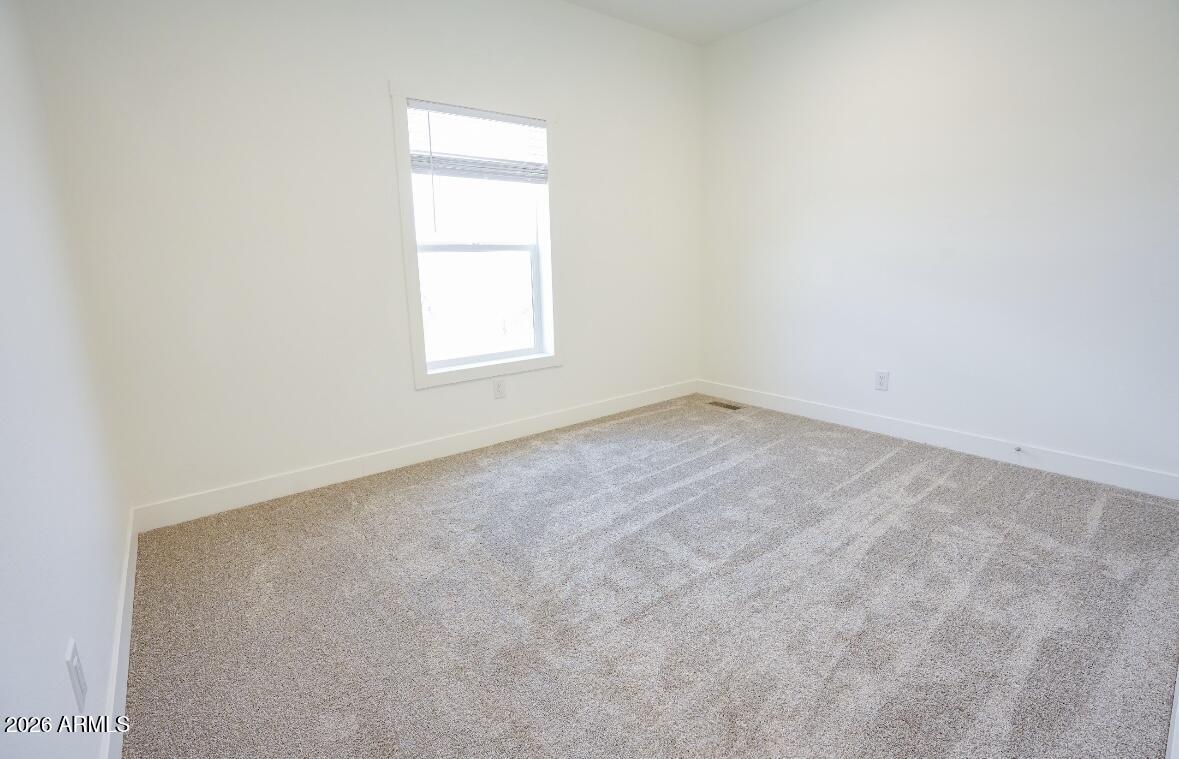 4710 Lazy Lariat Lane Rimrock, AZ 86335 - Photo 12 of 19 an empty room with a window
