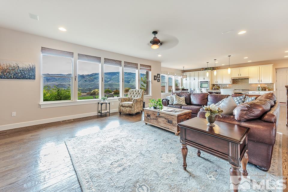 8564 Gypsy Hill Trail Reno, NV 89523 - Photo 16 of 25 a living room with furniture and a large window