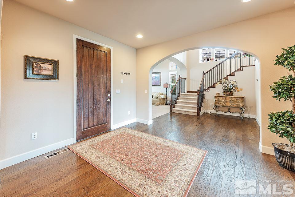 8564 Gypsy Hill Trail Reno, NV 89523 - Photo 2 of 25 a view of an entryway with wooden floor