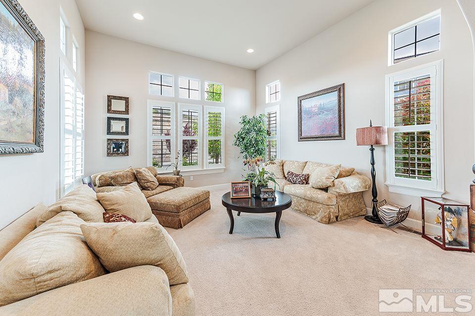 8564 Gypsy Hill Trail Reno, NV 89523 - Photo 4 of 25 a living room with furniture and windows
