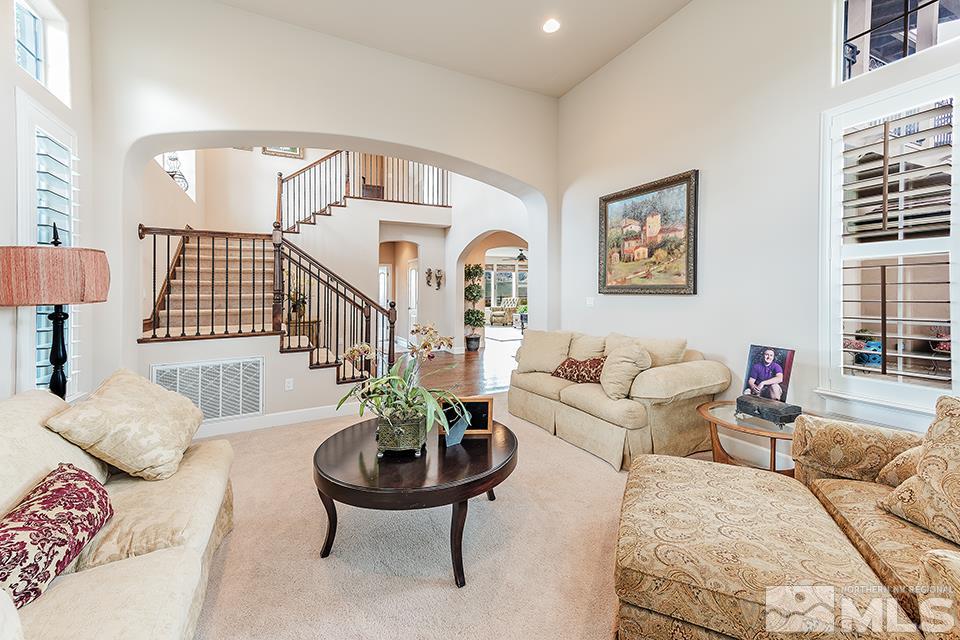 8564 Gypsy Hill Trail Reno, NV 89523 - Photo 5 of 25 a living room with furniture and a potted plant